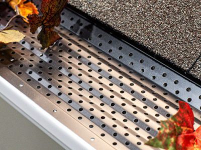 A gutter cover installed on brand new gutters in the Quad Cities area by a professional roofing and home improvement company.