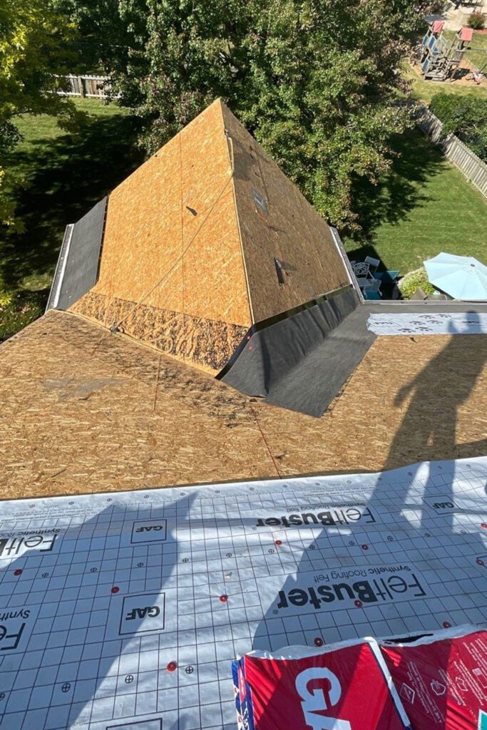 An aerial view of a GAF ice and water shield being installed on a residential roof in Davenport, IA.