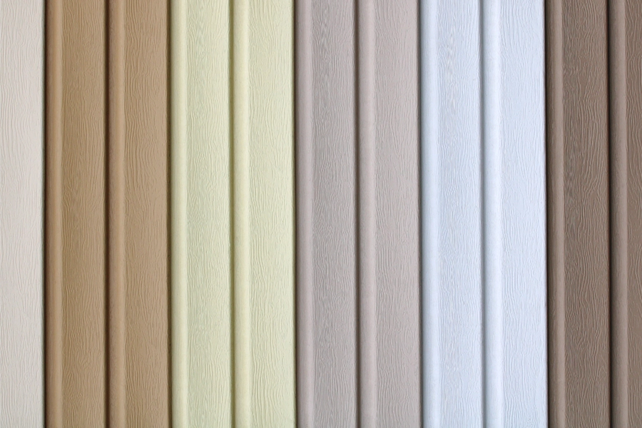 A variety of sample colors of vinyl siding next to each other in the Quad Cities.