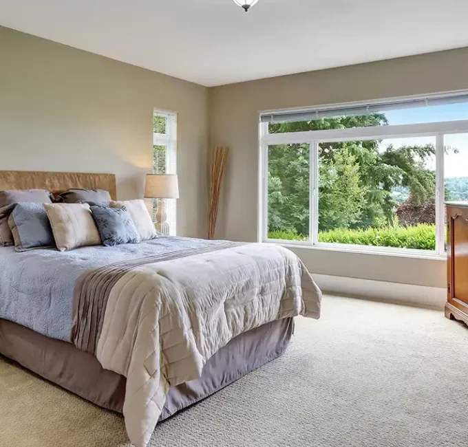 bedroom with large sliding windows