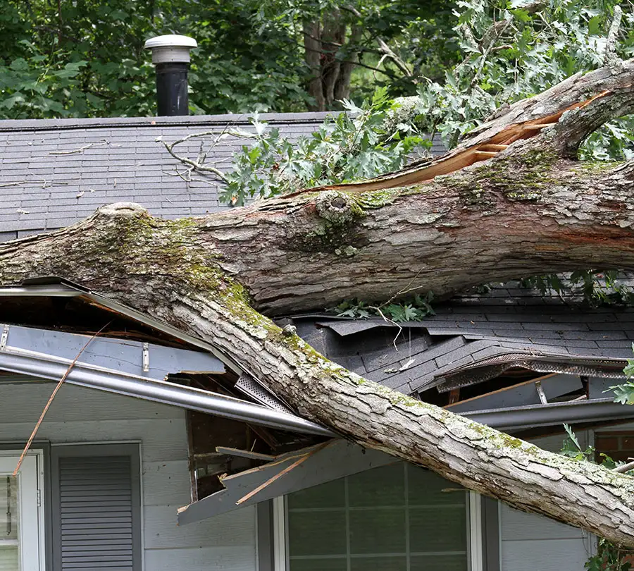 damaged roof, soffit, fascia, and gutters needing storm damage repair contractors in the quad cities