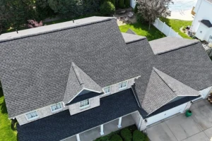 This is a picture of a roof with gray shingles newly installed by Mainstream Home Improvement in Moline, IL.