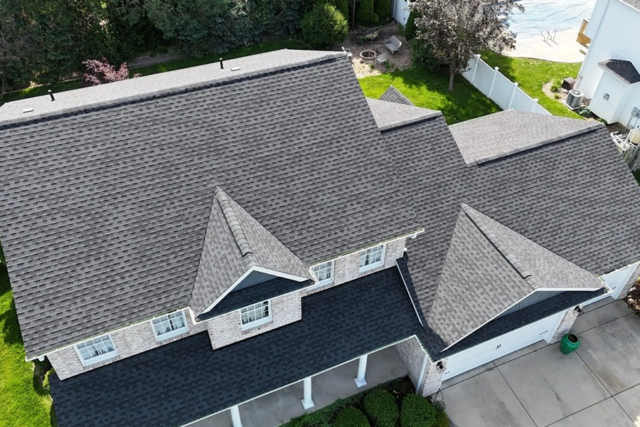 This is a picture of a roof with gray shingles newly installed by Mainstream Home Improvement in Moline, IL.