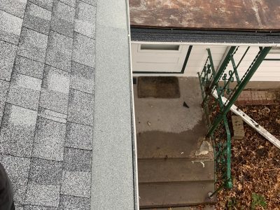 rock island gutter installation - corner house gutter, before