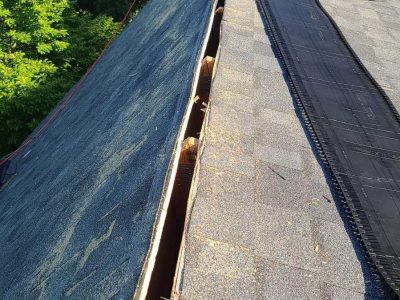 bettendorf roofing replacement - old roof being removed, during - 2