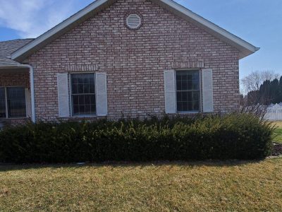 muscatine window installation - exterior side of brick house, before - 3