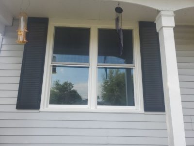 camanche window replacement - exterior dining room new window, after