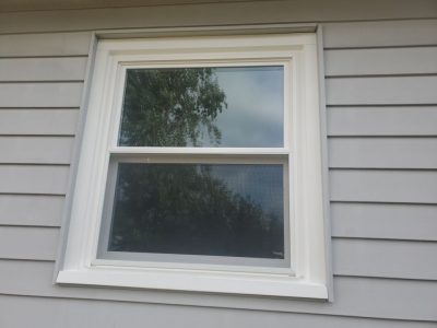 camanche window replacement - exterior bathroom new window, after