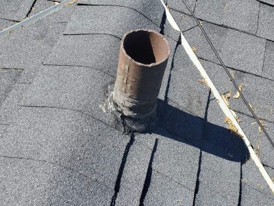 aledo roofing installation - old roof with furnace spout, before
