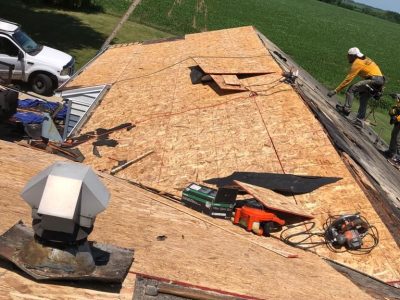aledo roofing installation - side slope of old roof being replaced, during
