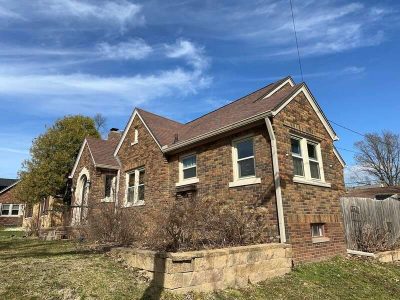 rock island roofing replacement - back side of house exterior, before