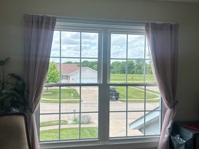 davenport window replacement - interior bedroom window with curtains, after