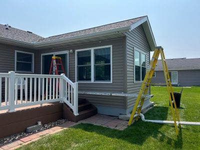 davenport window installation - exterior living room windows, during - 2