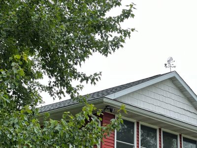 east moline roofing replacement - new gray roof on red house, after - 4