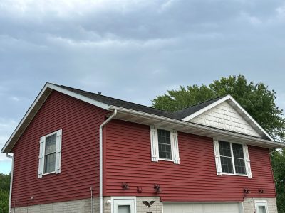east moline roofing replacement - close-up of exterior second level of house, before
