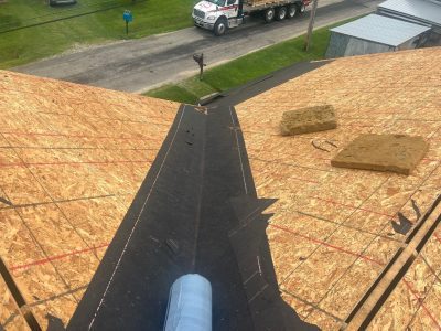 east moline roofing replacement - old roof being removed, during