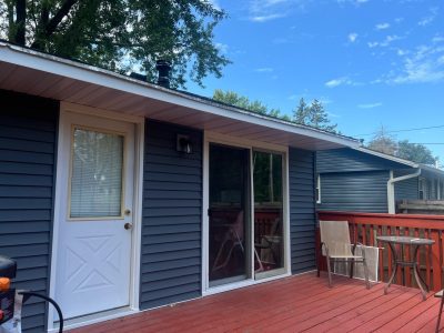 bettendorf siding replacement - back of house with deck, after - 2