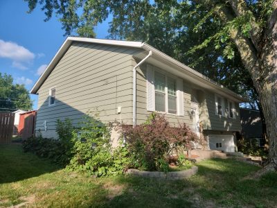 bettendorf siding replacement - exterior left side of house, before