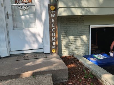 bettendorf siding replacement - exterior front door and steps, before