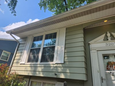 bettendorf siding replacement - exterior living room window, before