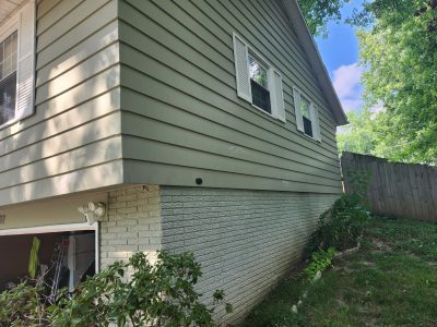 bettendorf siding replacement - exterior side of house with garage, before