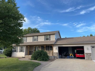 davenport roofing replacement - exterior of house with garage, before - 2