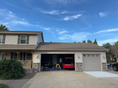davenport roofing replacement - exterior of house with garage, before