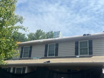 davenport roofing replacement - exterior front of house, during - 2