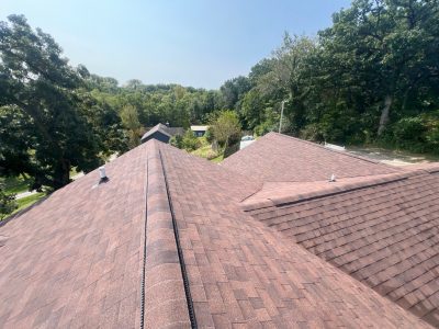 blue grass roofing installation - new peak of roof, after