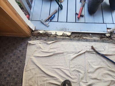 east moline patio door replacement - tarp and tools for patio door installation, during