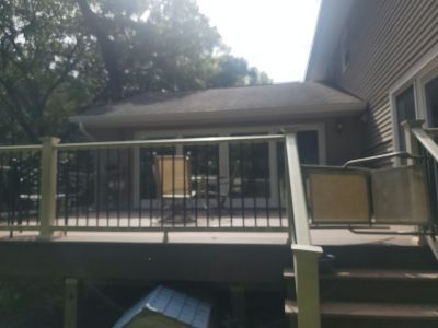 coal valley roofing installation - view of backyard deck, before