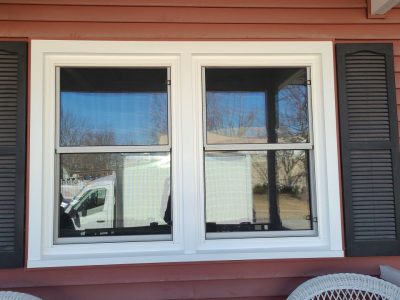 walcott window replacement - outside view of two new white windows, after