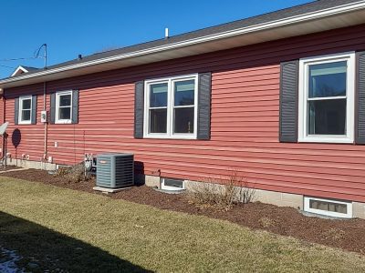 walcott window replacement - exterior side view of house with new updated windows, after