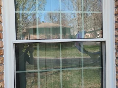 east moline window replacement - exterior close-up view of new white kitchen window, after