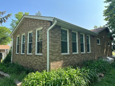 coal valley window replacement - outside view of house showcasing 8 new windows, after