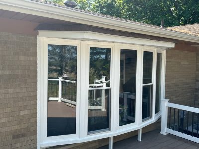 coal valley window replacement - new finished bay window with white framing, after