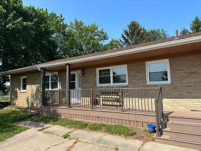 coal valley window replacement - outside view of front of tan brick house with new windows, before