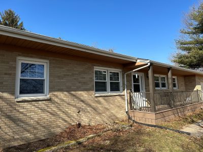 coal valley window replacement - outside view of front of tan brick house, before
