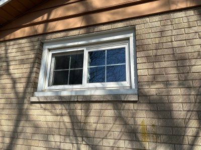 coal valley window replacement - outside view of single side-by-side white-framed window, before