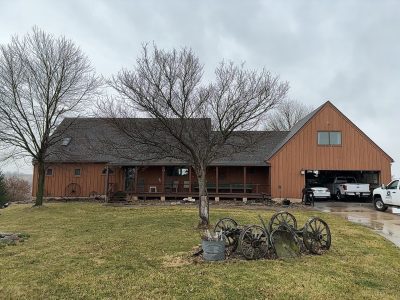 milan siding replacement - street view of brown ranch-style house, before