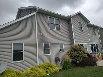 davenport roofing installation - backyard view of house with new roof, after
