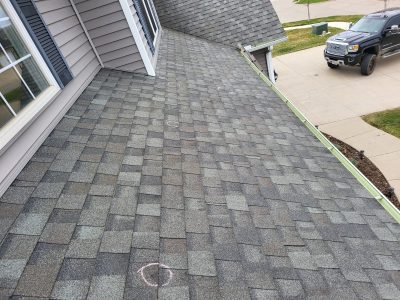 davenport roofing installation - side of broken roof, before