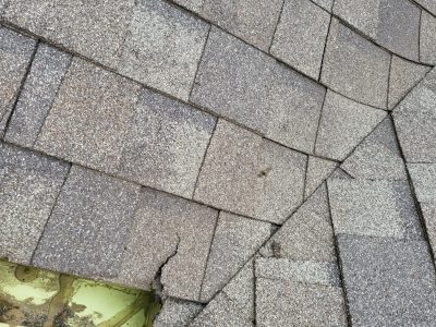 davenport roofing installation - corner of broken roof, before