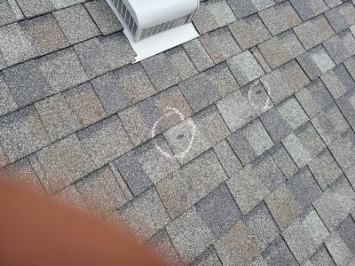 davenport roofing installation - circled broken roof tile, before