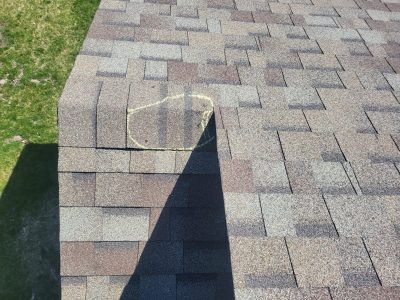davenport roofing replacement - damaged roof tiles near peak, before