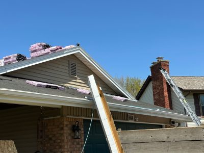 davenport roofing replacement - contractors replacing old roof, during