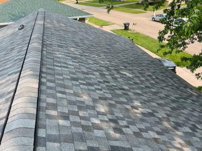 davenport roofing installation - new gray & white checkered roof peak, after