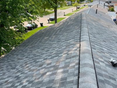 davenport roofing installation - new gray & white checkered roof peak, after - 2