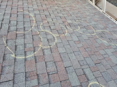 moline roofing replacement - bad spots circled on roof, before