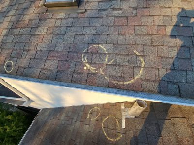 moline roofing replacement - bad spots circled on roof, before - 2